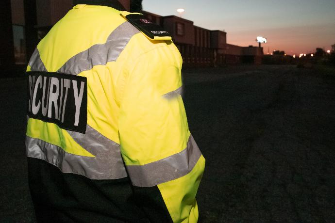 person in yellow and black nike jacket